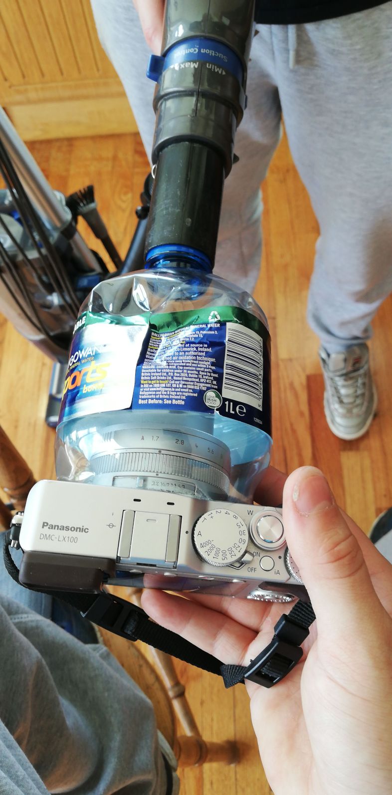 Water bottle and hoover hooked up to the camera